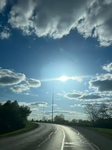 Chasing the sun down a winding road.